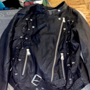 Leather jacket the brand is CI sono and it’s a large